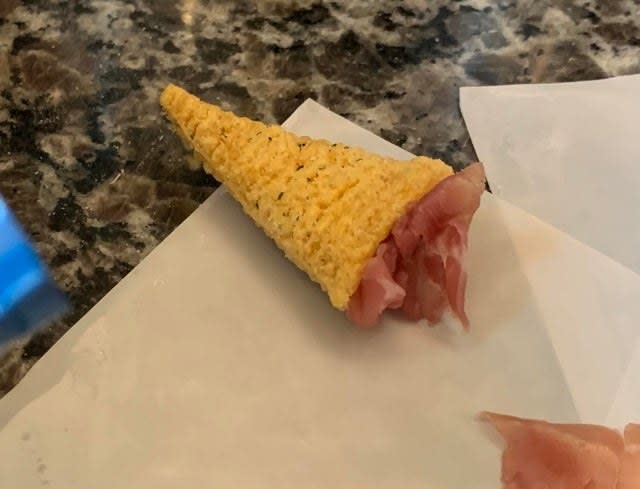 A Bugel chip stuffed with prosciutto.