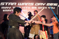 Children taking part in the lightsaber workshop conducted by Fightsaber. (Photo: Bryan Huang/Yahoo Singapore)