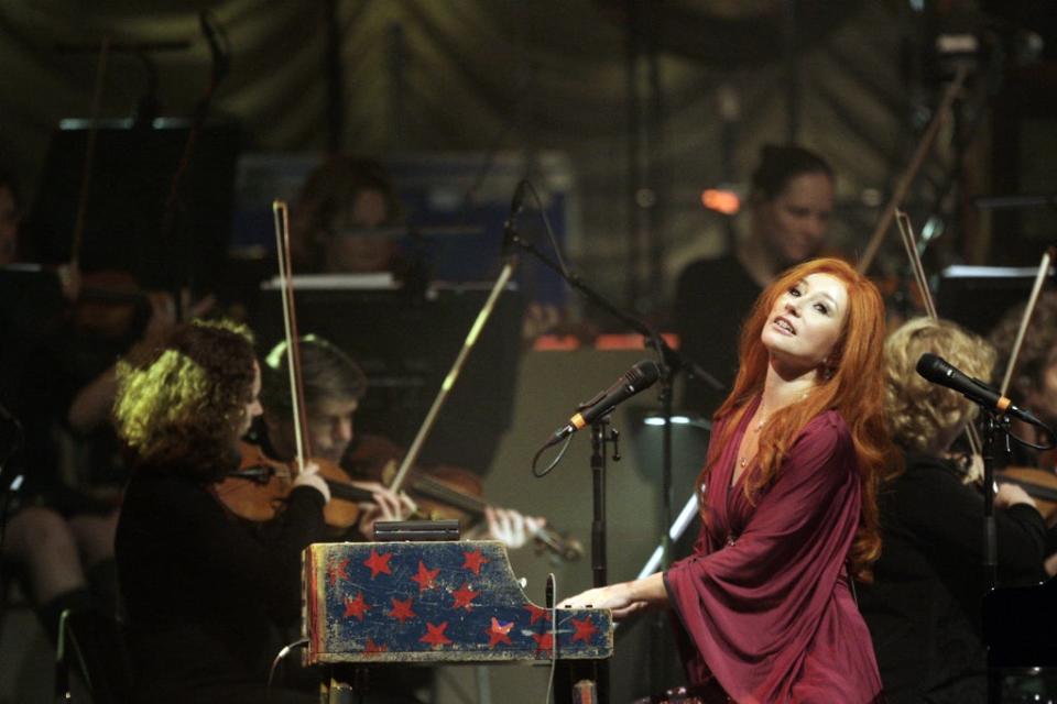 Amos on stage in 2010 (AFP via Getty)