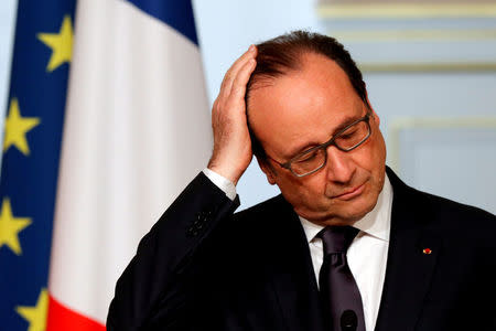 French President Francois Hollande attends a joint declaration with Benin's President Patrice Talon at the Elysee Palace in Paris, France, April 26, 2016. REUTERS/Philippe Wojazer/File Photo