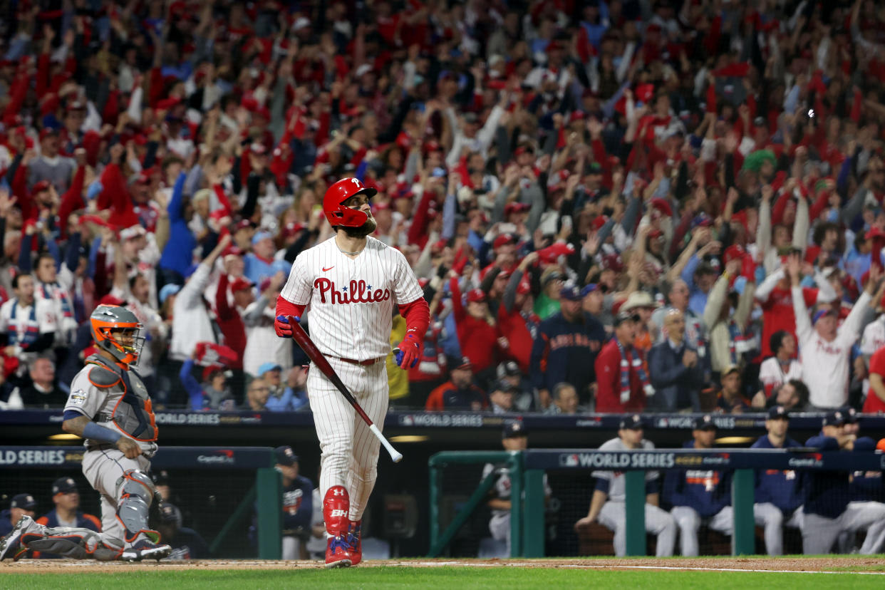Bryce Harper of the Philadelphia Phillies hits a two-run homer in the first inning during Game 3 of the World Series. (Photo by Mary DeCicco/MLB Photos via Getty Images)