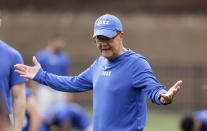 This photo taken Friday, Aug. 2, 2019, shows Duke head coach David Cutcliffe directs his players during an NCAA college football practice in Durham, N.C. (AP Photo/Gerry Broome)