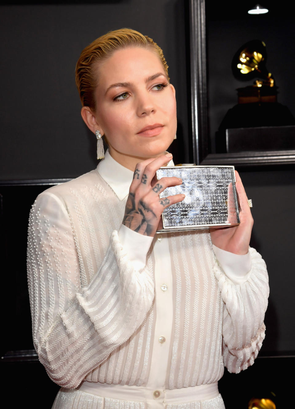 <p>Skylar Gray’s electronic bag flashed “equality” and “empowerment.” “It’s my women’s march,” she said on the red carpet. (Photo: Getty Images) </p>