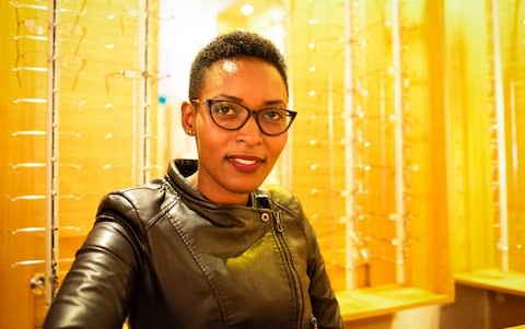 Tabitha Njeri, 26, an optometrist, poses for a portrait in her store in Wangige Town, Kiambu County, Kenya - Credit: Katie G. Nelson&nbsp;/The Telegraph