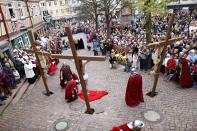 Actors take part in a re-enactment of the crucifixion of Jesus by the Romans on Good Friday 2012 in Bensheim, Germany. Christians all over the world take part in processions retracing the steps tradition says Jesus Christ took to his crucifixion.