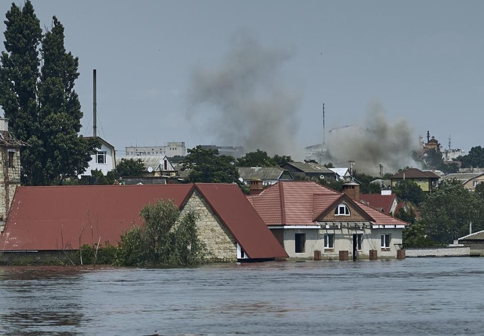 FILE - A view of a flooded neighborhood in Kherson, Ukraine, Thursday, June 8, 2023. Floodwaters from a collapsed dam kept rising in southern Ukraine on Thursday, forcing hundreds of people to flee their homes in a major emergency operation that brought a dramatic new dimension to the war with Russia, now in its 16th month. (AP Photo/Libkos, File)
