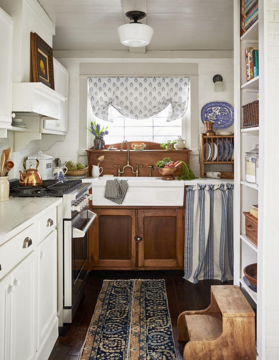 blue and white and tiny farmhouse kitchen