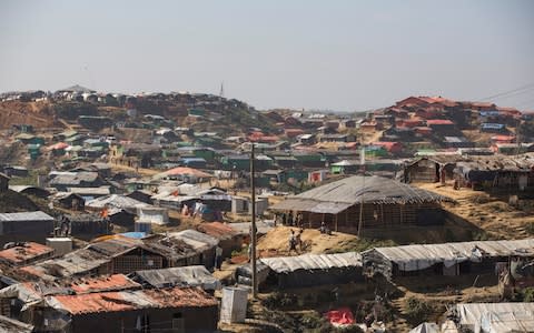 Many of the trafficked women live in desperate conditions in camps - Credit: Heathcliff O'Malley/The Telegraph