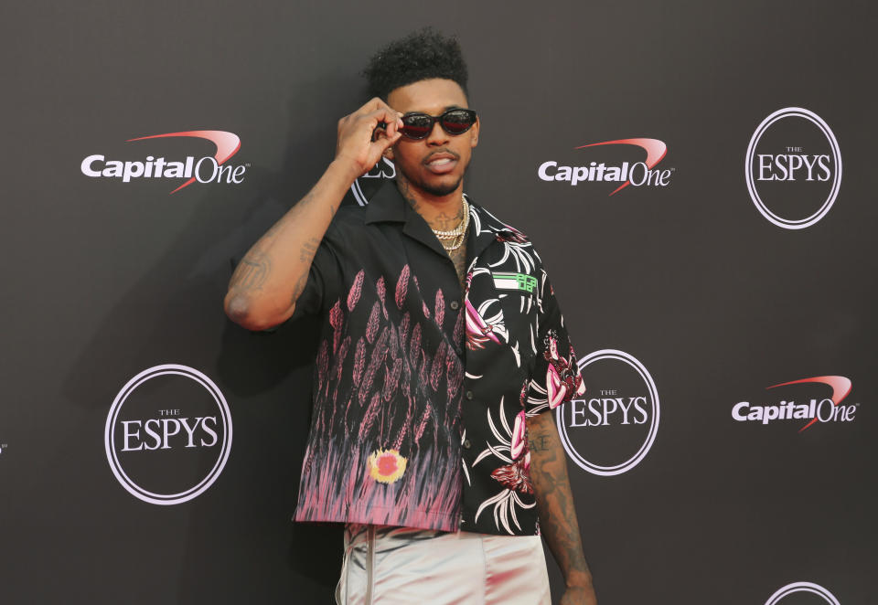 Nick Young has rarely been shy about posing for the camera. (AP)