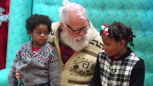 Hipster Santa With Man-Bun and Chunky Glasses