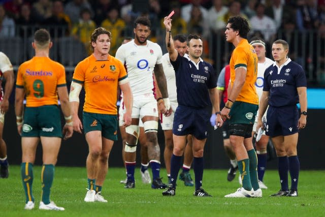 Australia’s Darcy Swain is shown a red card by referee James Doleman