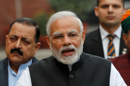 FILE PHOTO: India's Prime Minister Narendra Modi speaks with the media inside the parliament premises on the first day of the winter session, in New Delhi, India, December 11, 2018. REUTERS/Adnan Abidi/File Photo