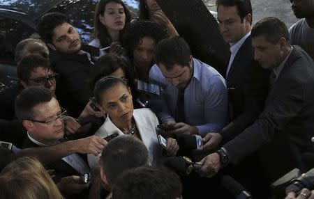 Presidential candidate Marina Silva of Brazilian Socialist Party (PSB) speaks during a news conference in front of her apartment before a television debate at the SBT TV studio in Sao Paulo September1, 2014. REUTERS/Nacho Doce