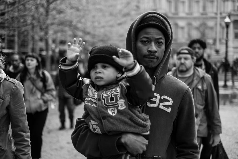 Residents of Baltimore gather during the community’s response to the 2015 in-custody death of Freddie Gray. The photo is part of a collection called “the Impact of Images” collection curated by Lead With Love, in collaboration with the studio and production company behind the film “Till.” (Devin Allen via AP)