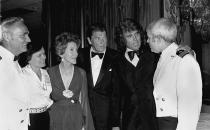 <p>Former California Governor Ronald Reagan, center, actor Michael Landon, second from right, and the governor’s wife Nancy, third from left, greet former POWs during a reunion party in Los Angeles May 28 1978. At left, U.S. Navy Capt. Howard Ruttledge and his wife, Phyllis. At right is U.S. Navy Commander John McCain. (Photo: Brich/AP) </p>