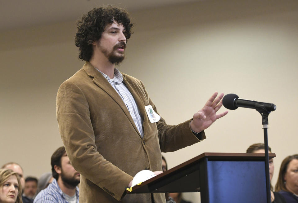 James Cockrum expresses his opposition to the removal of the book, "Maus," from the curriculum at a McMinn County School Board meeting, Thursday, Feb. 10, 2022, in Athens, Tenn. The board heard from concerned citizens about the removal of the Pulitzer Prize-winning graphic novel about the Holocaust from the district's curriculum. Cockrum was one of a handful of people who spoke out at the meeting to try to persuade its members to reconsider a decision that has sparked international attention and renewed concerns about book bans and the growing threat of antisemitism. (Robin Rudd/Chattanooga Times Free Press via AP)