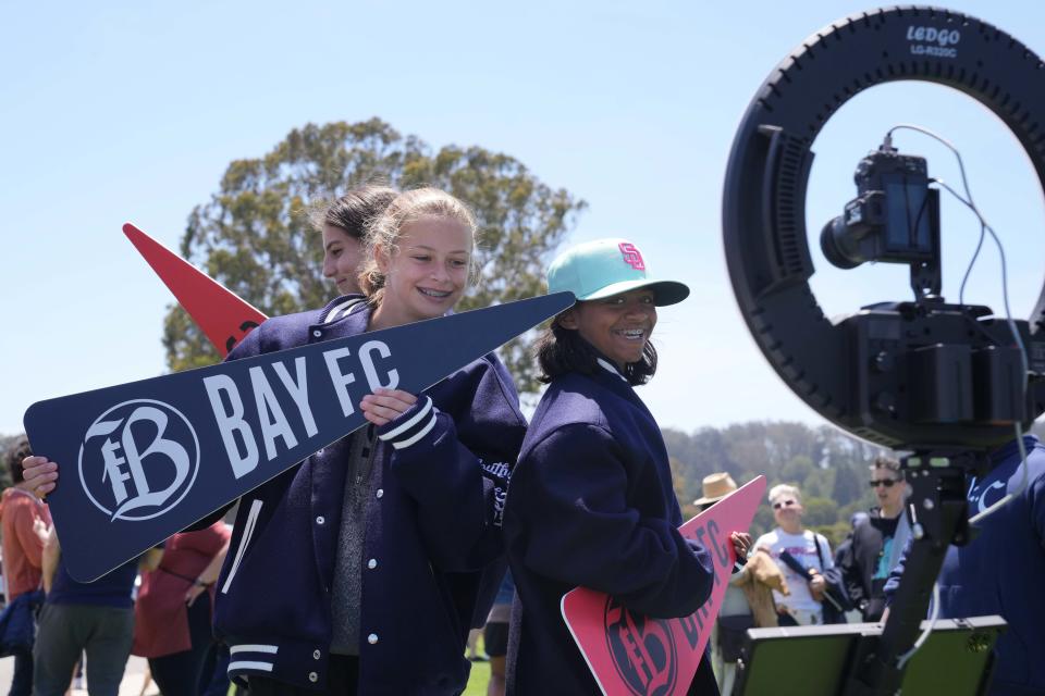 Jun 3, 2023; San Francisco, California, USA; Fans use the 3D photo booth during the Bay FC Day for the Bay event at Presidio Main Post Lawn. Mandatory Credit: Darren Yamashita-USA TODAY Sports