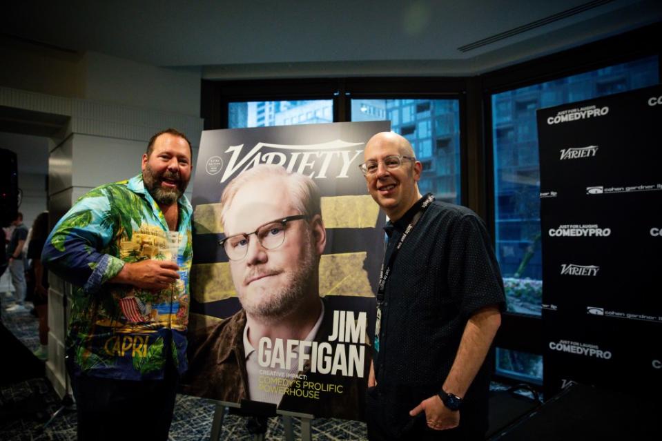 Bert Kreischer and UTA’s Nick Nuciforo pose with Variety’s cover story on Jim Gaffigan.