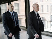 Former Minneapolis police officer J. Alexander Kueng, left, and his attorney Thomas Plunkett arrive for sentencing for violating George Floyd's civil rights outside the Federal Courthouse Wednesday, July 27, 2022 in St. Paul, Minn. The last two former Minneapolis police officers who were convicted of violating George Floyd’s civil rights have been sentenced in federal court. J. Alexander Kueng was sentenced Wednesday to three years and Thao got a 3 1/2-year sentence. They were convicted in February of two counts of violating Floyd’s civil rights. (David Joles/Star Tribune via AP)