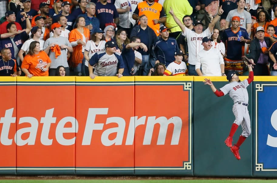 Red Sox right fielder Mookie Betts clearly and cleanly robs the Astros Alex Bregman of a home run in ALCS Game 5. (Getty Images)