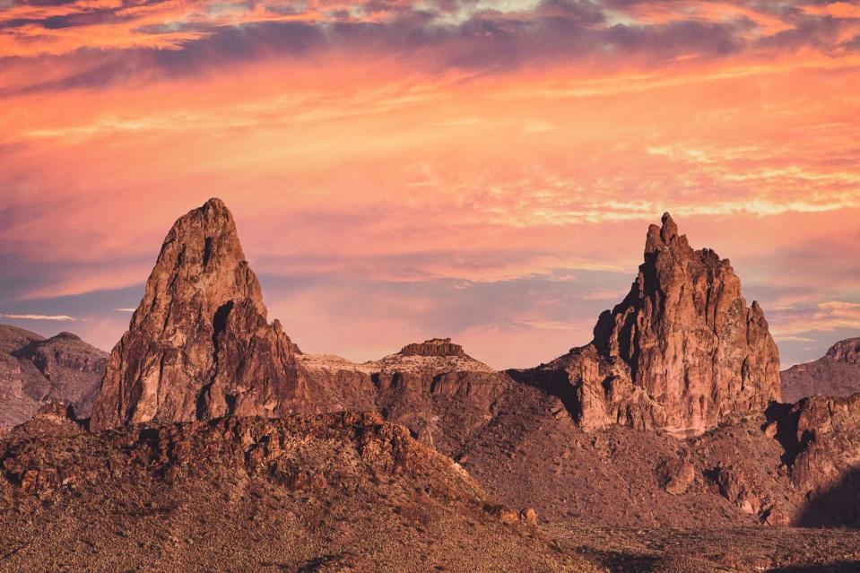 Big Bend's Iconic Mule Ears mountain formation at sunset