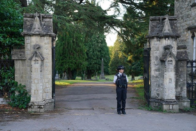 Police at the cemetery in Enfield, north London where Kyle Clifford was found