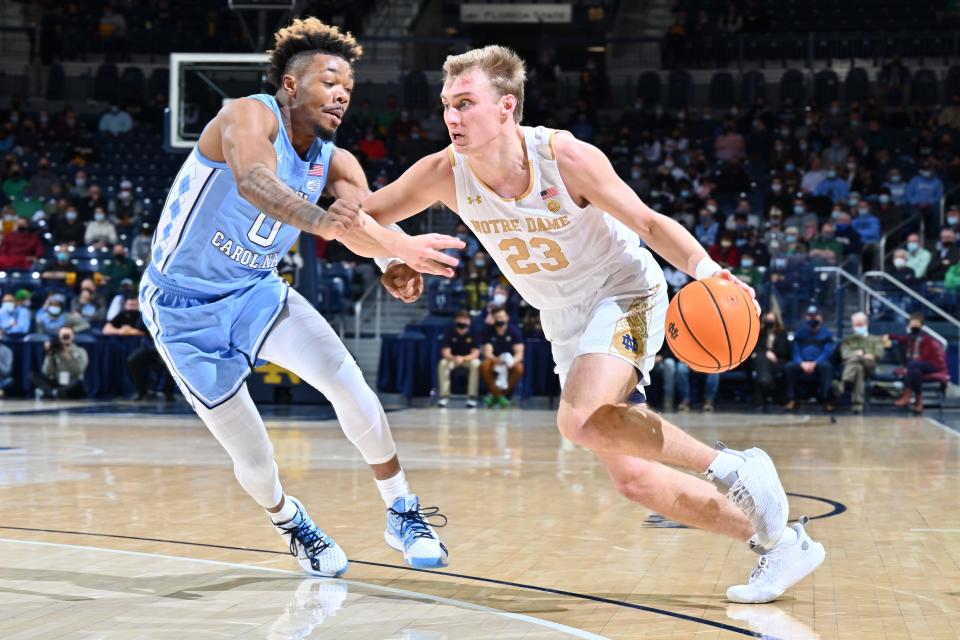 North Carolina guard Anthony Harris, left, defends against Notre Dame guard Dane Goodwin earlier this month in an ACC game.