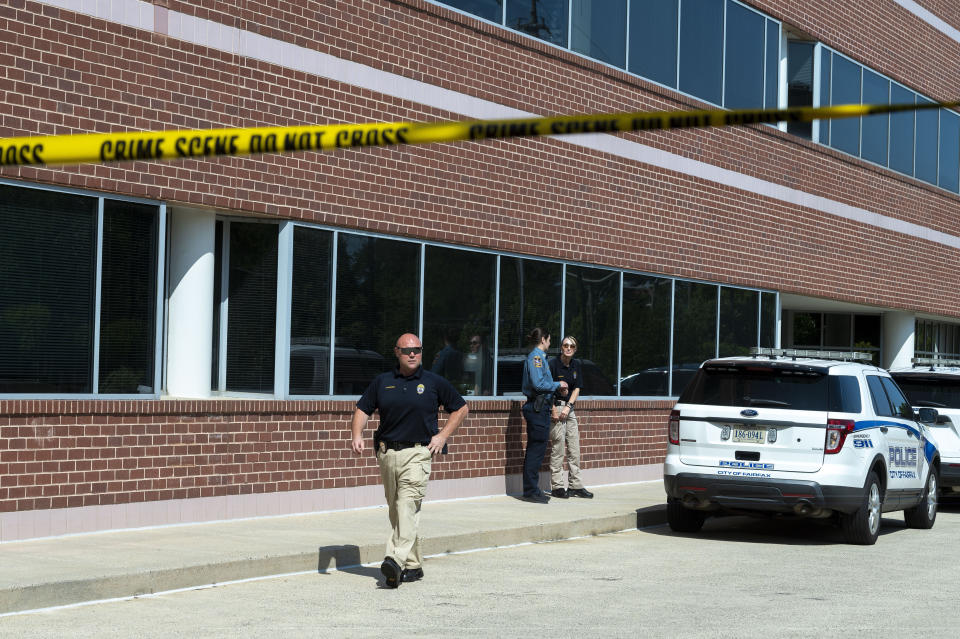 Law enforcement investigate after an attack at the office of Rep. Gerry Connelly, D-Va., in Fairfax, Va., Monday, May 15, 2023. A man with a baseball bat walked into Connolly's Fairfax office, asked for him, and then struck two members of his staff with the bat, police said. Fairfax City Police in northern Virginia said in a tweet that a suspect is in custody and the victims are being treated for injuries that are not life-threatening. (AP Photo/Cliff Owen)