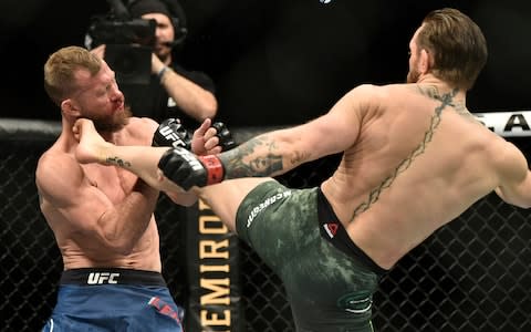 McGregor's high kickeffectively ended Cerrone's night - Credit: CHRIS UNGER/ZUFFA/LLC