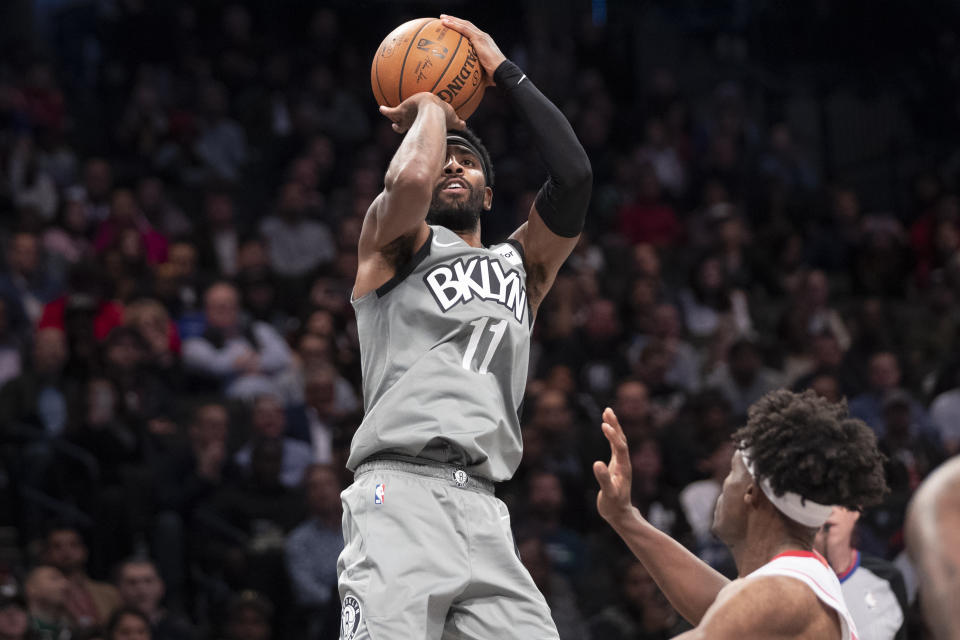 Brooklyn Nets guard Kyrie Irving shoots a 3-point basket during the second half of the team's NBA basketball game against the Houston Rockets, Friday, Nov. 1, 2019, in New York. The Nets won 123-116. (AP Photo/Mary Altaffer)