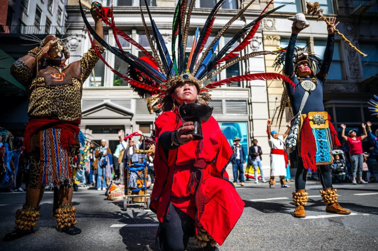 Participants in the Indigenous Peoples Of the Americas Parade in New York City, Oct. 15, 2022. <a href="https://www.gettyimages.com/detail/news-photo/people-participate-in-the-first-annual-indigenous-peoples-news-photo/1434017560" rel="nofollow noopener" target="_blank" data-ylk="slk:Alexi Rosenfeld/Getty Images;elm:context_link;itc:0;sec:content-canvas" class="link ">Alexi Rosenfeld/Getty Images</a>