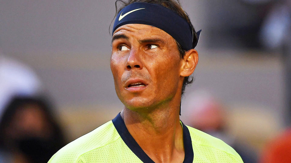 Rafael Nadal, pictured here looking at the stadium lights at the French Open.