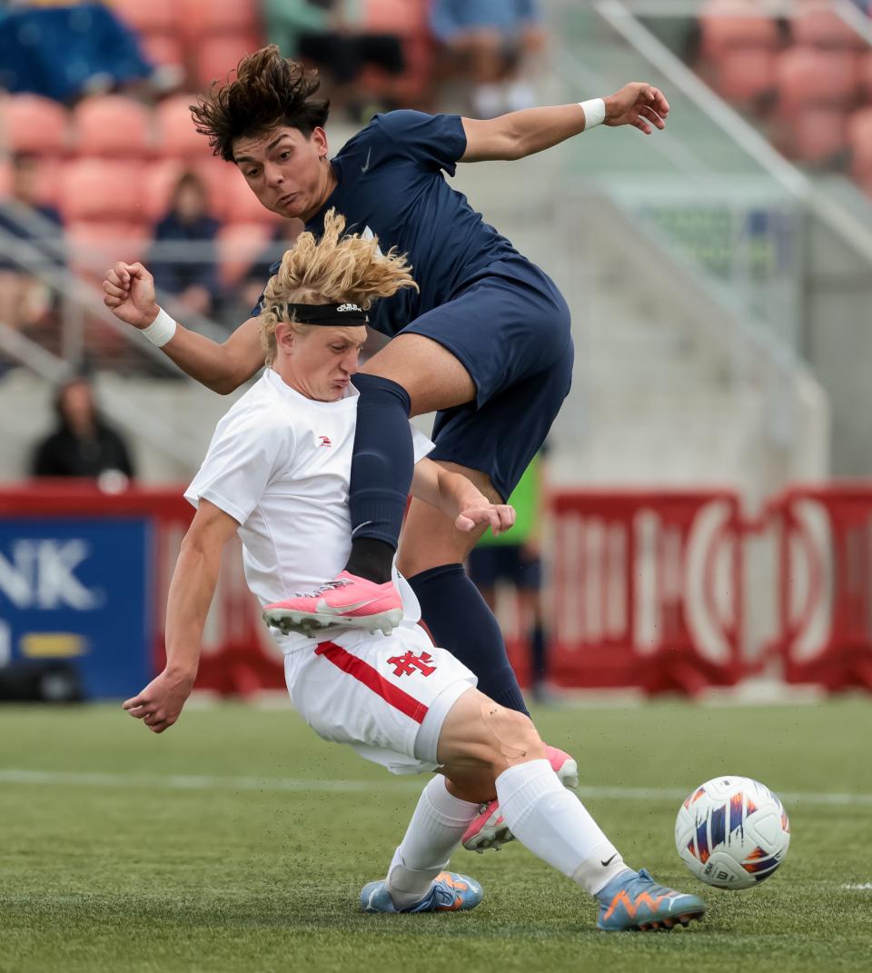 Manti’s Trace Justesen and Juan Diego’s Jacob Alvarez compete for the ball in a 3A boys soccer state semifinal at Zions Bank Stadium in Herriman on Wednesday, May 10, 2023. | Spenser Heaps, Deseret News