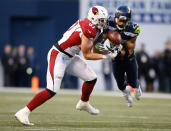 <p>Free safety Earl Thomas #29 of the Seattle Seahawks nearly intercepts the ball against tight end Troy Niklas #87 of the Arizona Cardinals in the fourth quarter at CenturyLink Field on December 31, 2017 in Seattle, Washington. (Photo by Otto Greule Jr /Getty Images) </p>