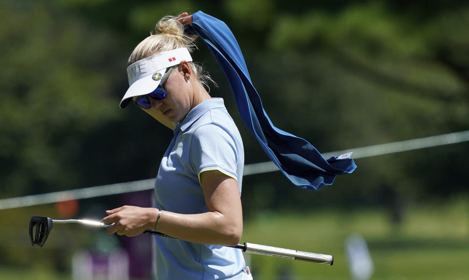 Madelene Sagstrom, of Sweden, walks on 13th green during the first round of the women's golf event at the 2020 Summer Olympics, Wednesday, Aug. 4, 2021, at the Kasumigaseki Country Club in Kawagoe, Japan. (AP Photo/Matt York)