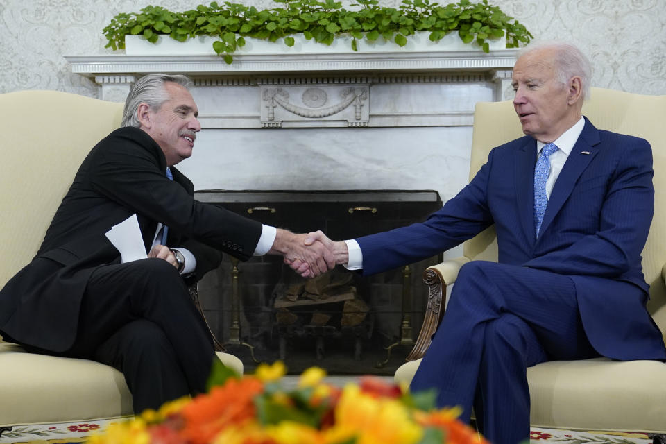 President Joe Biden meets with Argentina's President Alberto Fernandez in the Oval Office of the White House in Washington, Wednesday, March 29, 2023. (AP Photo/Susan Walsh)