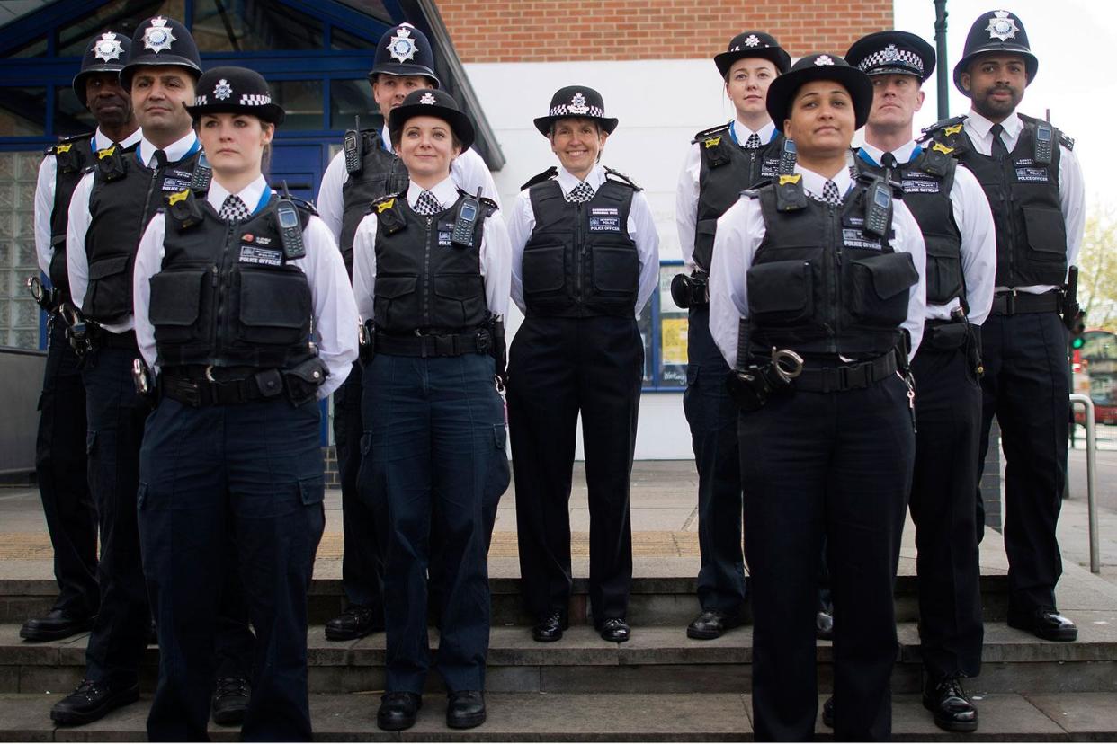 Cressida Dick, centre, with officers from the Met: Justin Tallis AFP: Getty Images