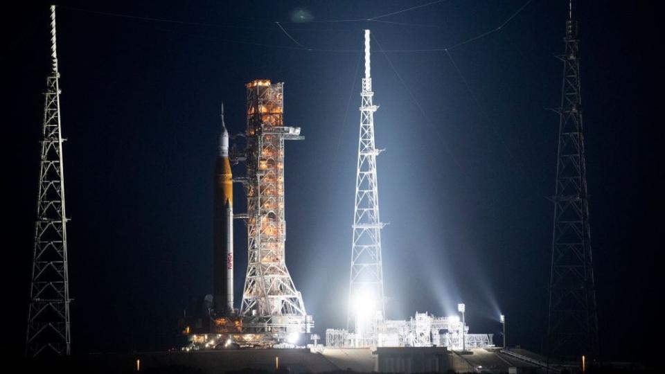 CAPE CANAVERAL, FL - AUGUST 17: In this handout image provided by NASA, NASA's Space Launch System (SLS) rocket with the Orion spacecraft aboard is seen atop a mobile launcher as it rolls out of the Vehicle Assembly Building to Launch Complex 39B at Kennedy Space Center on August 17, 2022 in Cape Canaveral, Florida. NASA's Artemis I mission is the first integrated test of the agency's deep space exploration systems, which includes the Orion spacecraft, SLS rocket, and supporting ground systems. Launch of the uncrewed flight test is targeted for no earlier than August 29. (Photo by Joel Kowsky/NASA via Getty Images)