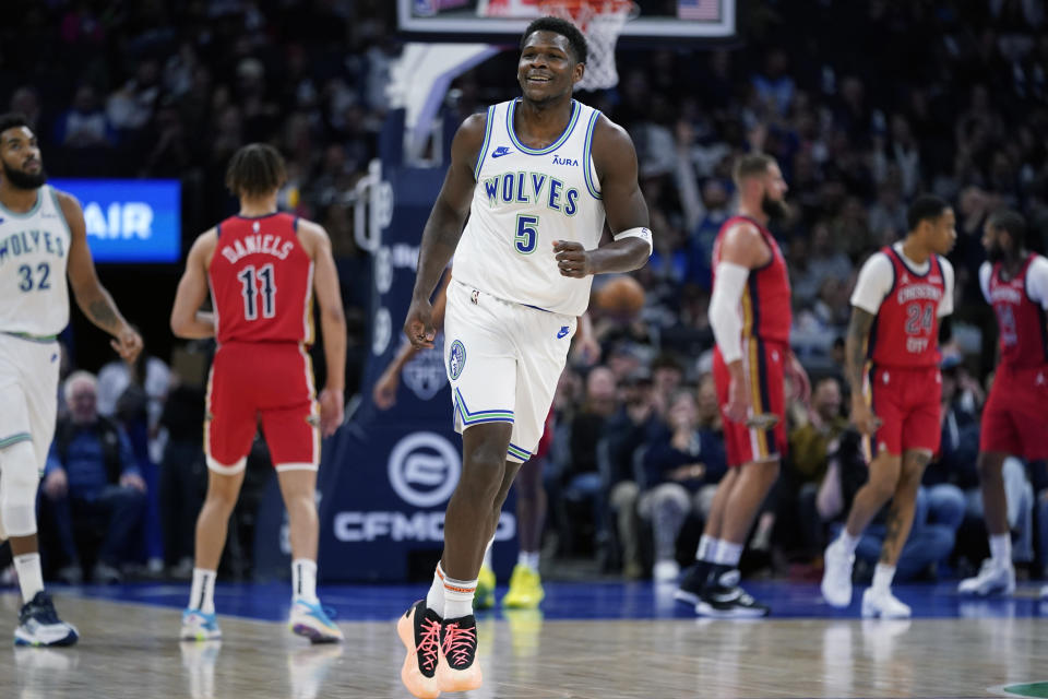 Minnesota Timberwolves guard Anthony Edwards (5) reacts after making a shot during the first half of an NBA basketball game against the New Orleans Pelicans, Wednesday, Nov. 8, 2023, in Minneapolis. (AP Photo/Abbie Parr)