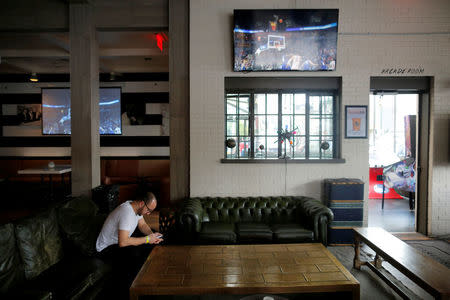 Bassel Almadani, who is first-generation Syrian-American and leader of the band Bassel and the Supernaturals, prepares a set list for a performance at Parlor and Yard during the South by Southwest (SXSW) Music Film Interactive Festival 2017 in Austin, Texas, U.S. March 16, 2017. REUTERS/Brian Snyder