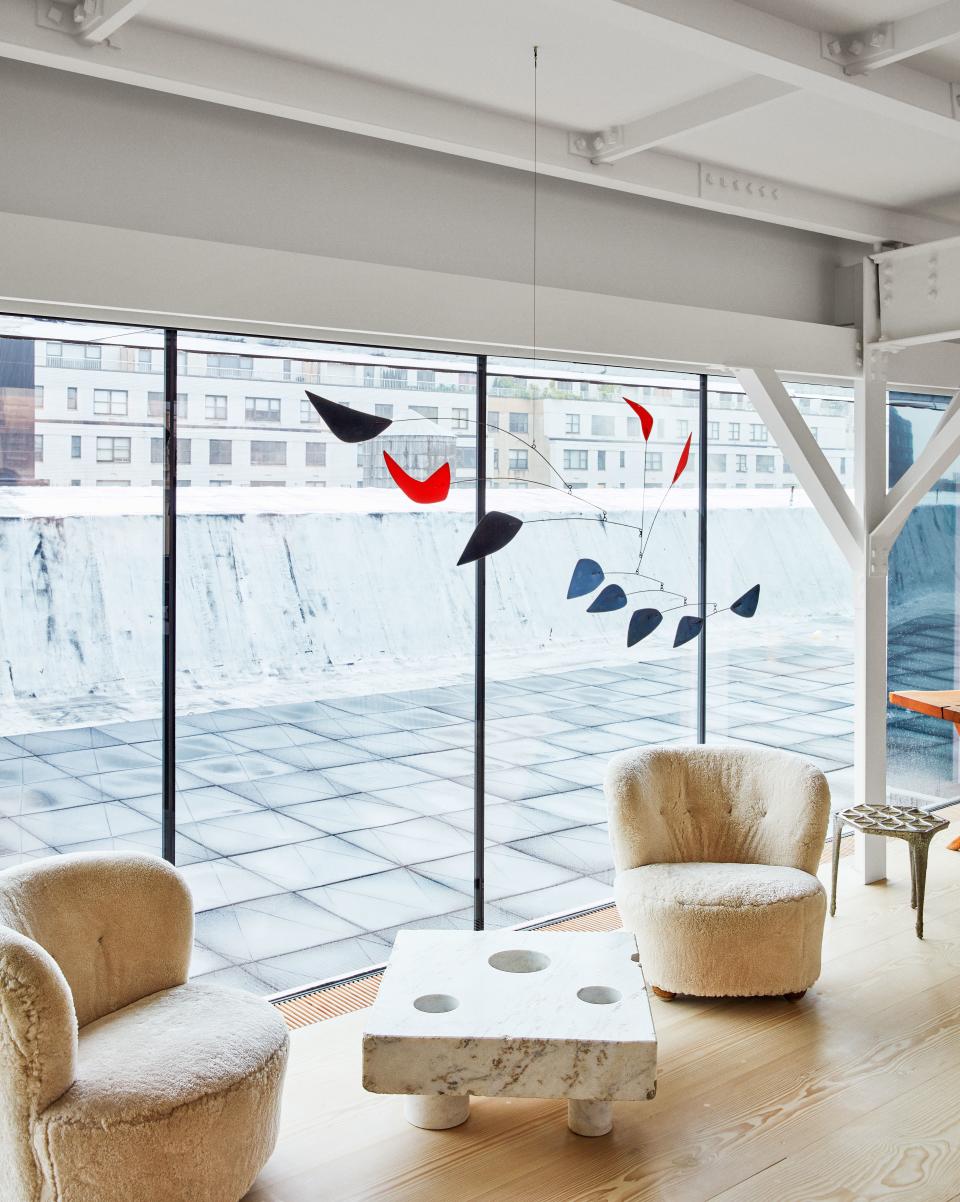 Alexander Calder mobile and Flemming Lassen chairs.