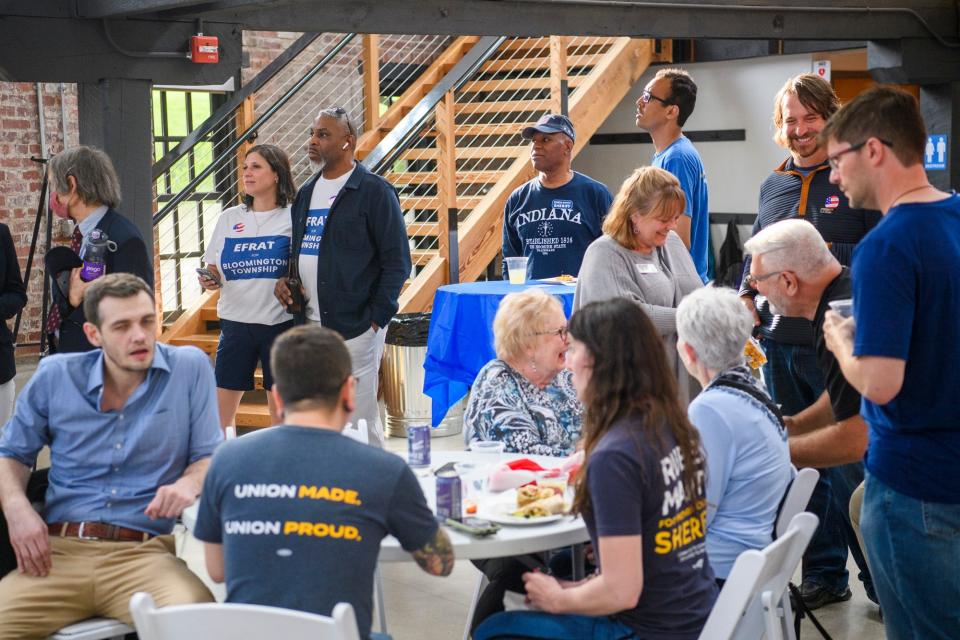 Candiates and Democratic supporters watch the results come in at the Democratic watch party at The Mill on Tuesday, May 3, 2022.