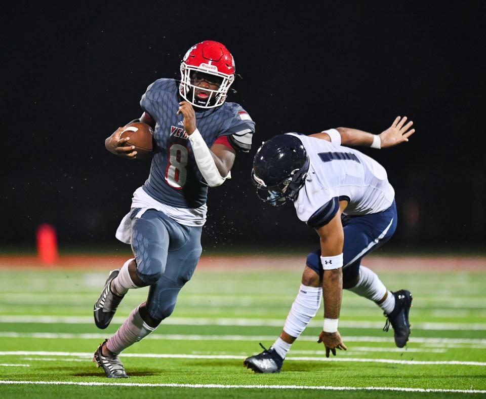 Vero Beach's Jonathan Hillsman (8) gains yardage in a high school preseason football game against William T. Dwyer on Thursday, Aug. 17, 2023.