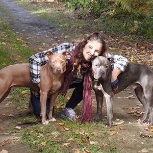 Heidi Curtis, pictured with her two rescued dogs, Apollo and Aphrie.