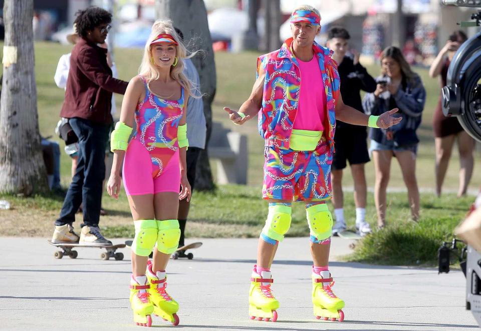 Margot Robbie and Ryan Gosling rollerskate through Venice Beach while filming 'Barbie' in Los Angeles, California