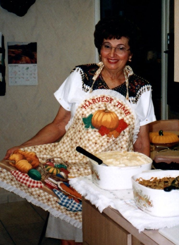 Anna Meckstroth wears an apron made in 1998 by her daughter, Janet Meckstroth.