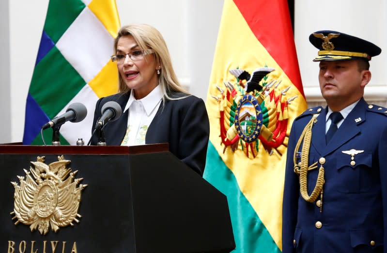 Bolivia's interim President Jeanine Anez enacts the law for general election at the national congress