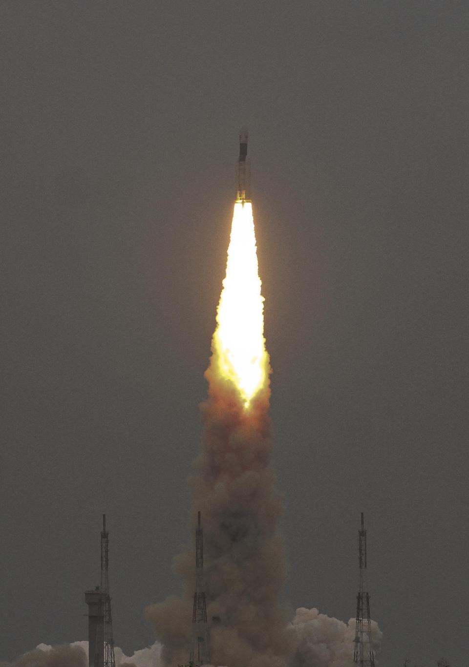 Indian Space Research Organization (ISRO)'s Geosynchronous Satellite launch Vehicle (GSLV) MkIII carrying Chandrayaan-2 lifts off from Satish Dhawan Space center in Sriharikota, India, Monday, July 22, 2019. India successfully launched an unmanned spacecraft to the far side of the moon on Monday, a week after aborting the mission due to a technical problem. (AP Photo)