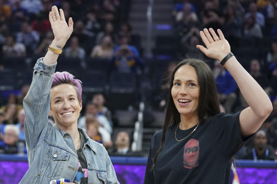 Megan Rapinoe and Sue Bird are active in community work and activism. (Kyle Terada-USA TODAY Sports)