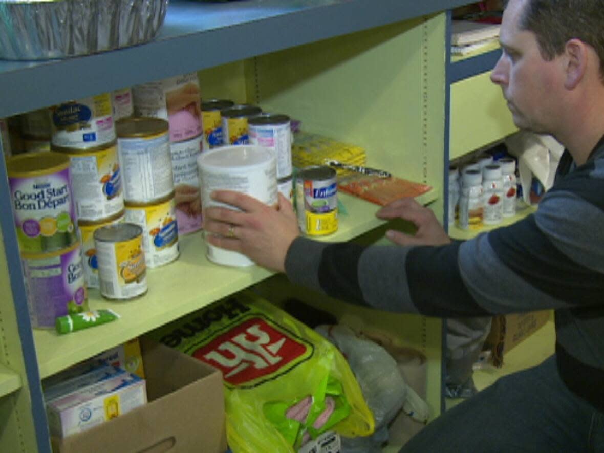 Donations of money during the Feed a Family campaign help keep shelves at the food bank stocked through the winter, says executive director Mike MacDonald. (CBC - image credit)